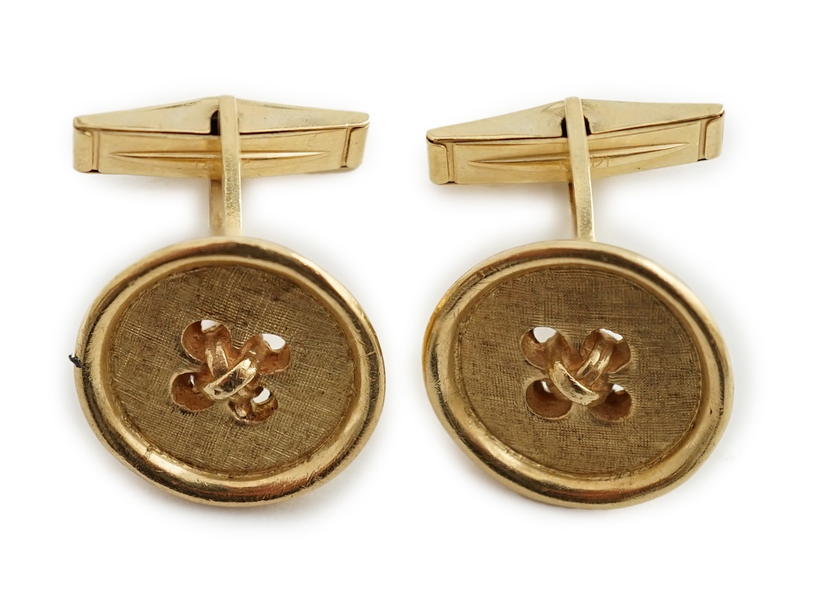 A pair of 14K yellow gold button design cufflinks, by Merrin & Co